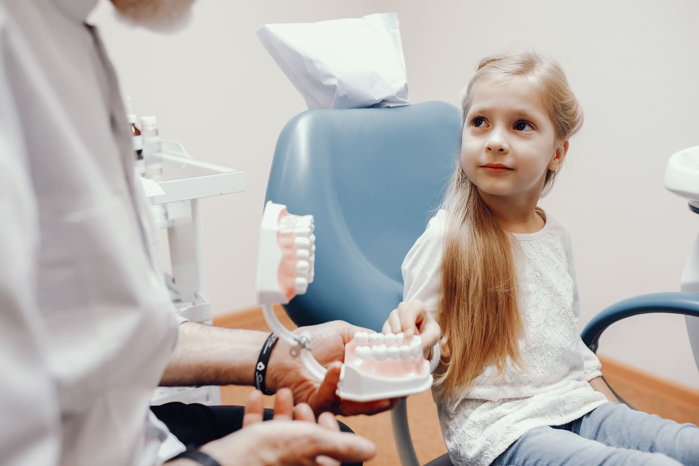cute-little-girl-sitting-dentist-s-office